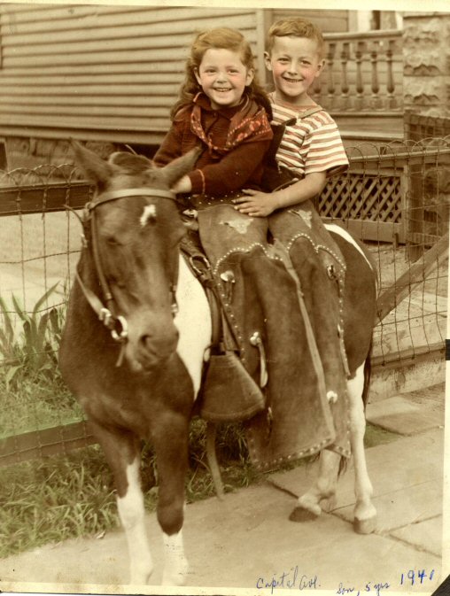 Cleveland, 1941. My brother and I. Taken by a roving photographer with a pony.